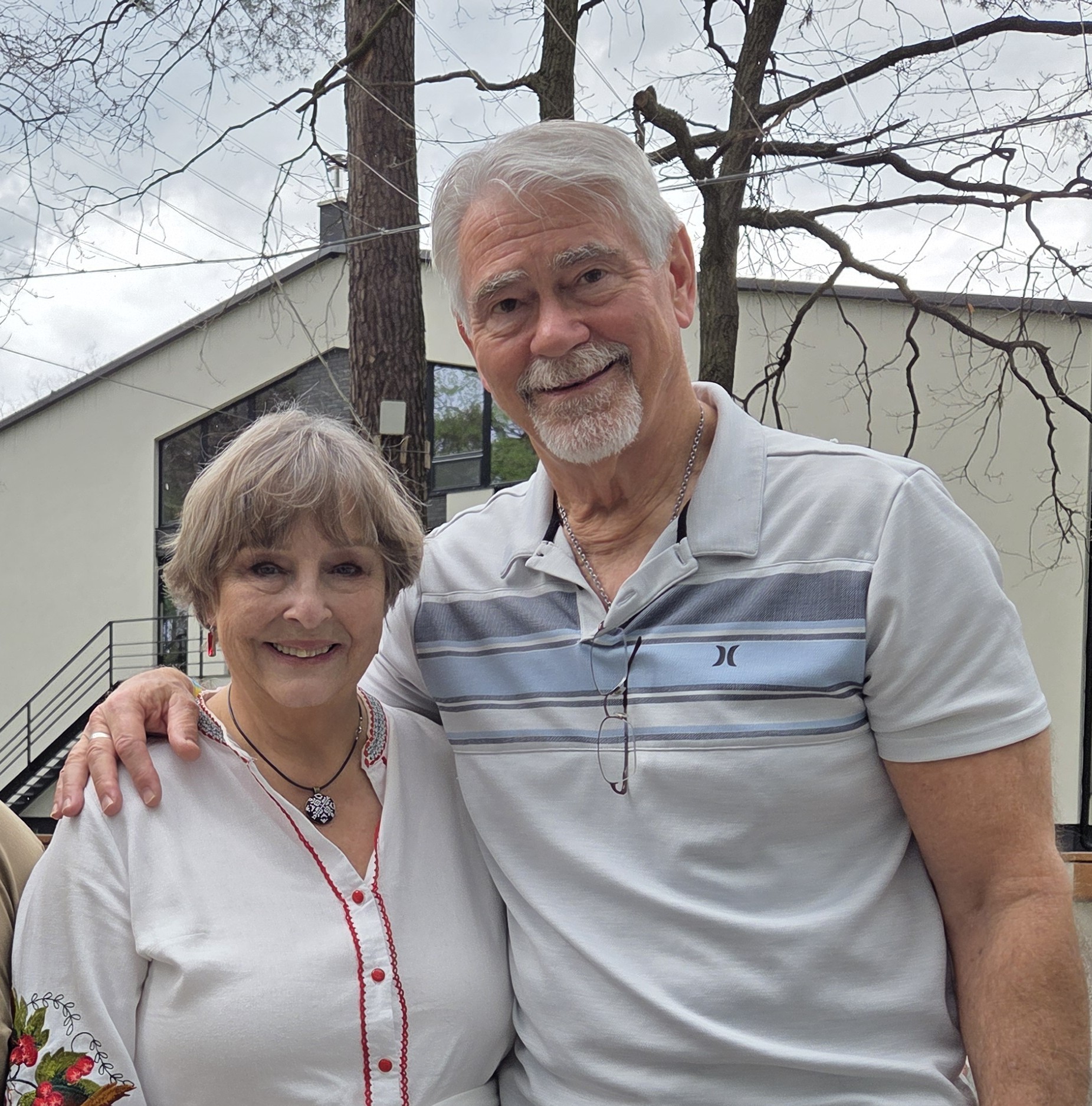 Chris and Rahnella pictured with a Ukrainian ministry leader.